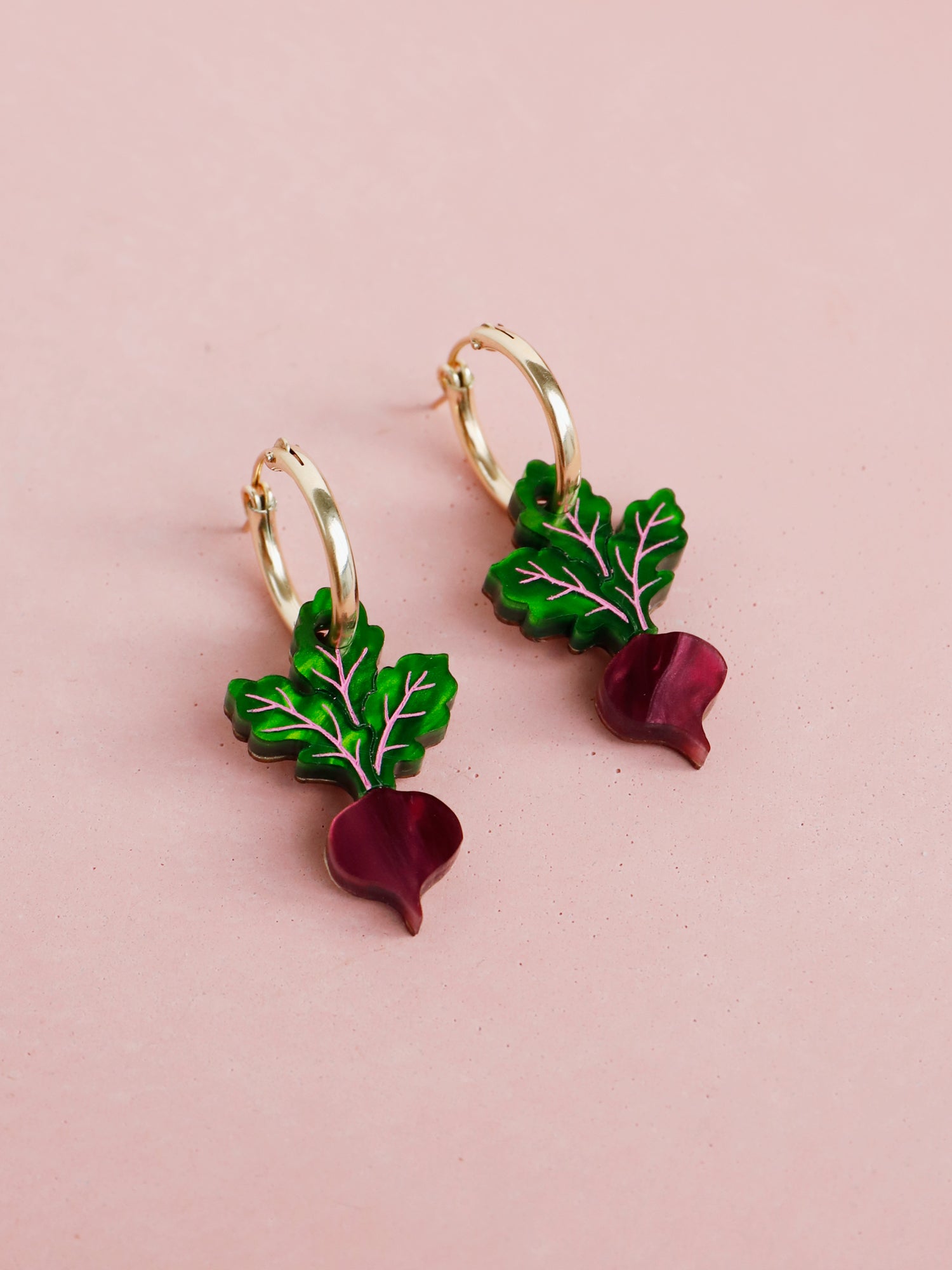 Purple and green hand-inked beetroot acrylic mini charms with optional gold-filled hoops. Handmade in London by Wolf & Moon.