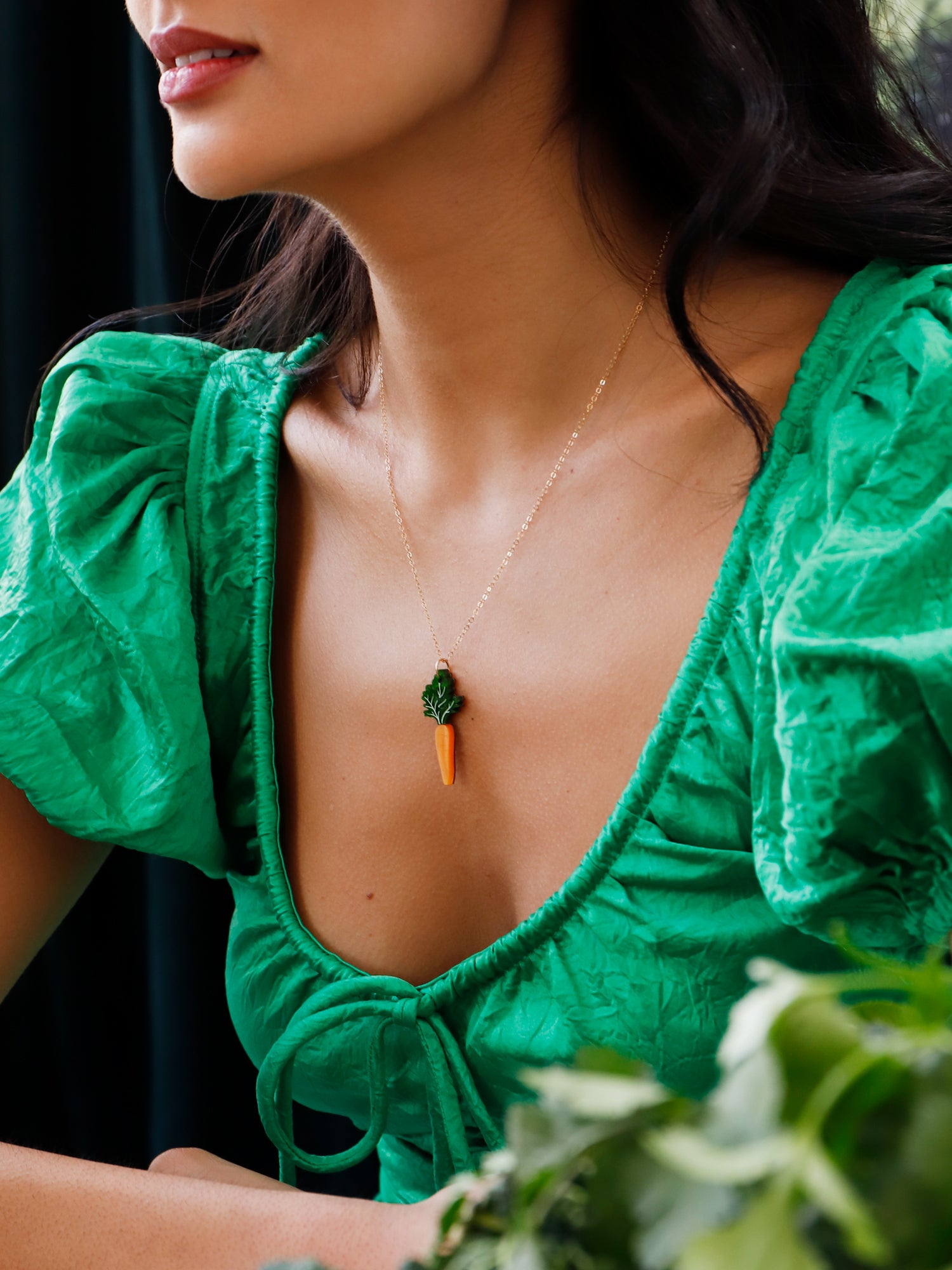 Green and orange hand-inked acrylic mini carrot pendant with optional gold-filled chain. Handmade in London by Wolf & Moon.