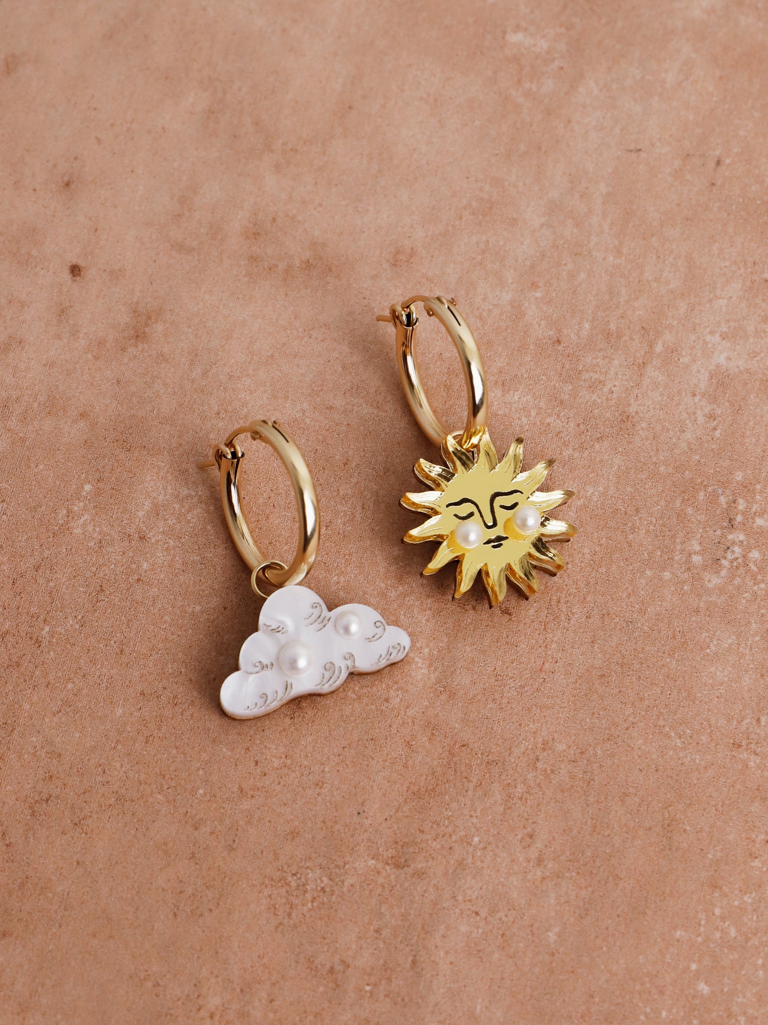 Sun & Cloud Hoops. Charm earrings made with laser cut acrylic, Czech glass pearls and hand inked details. Handmade in the UK by Wolf & Moon.
