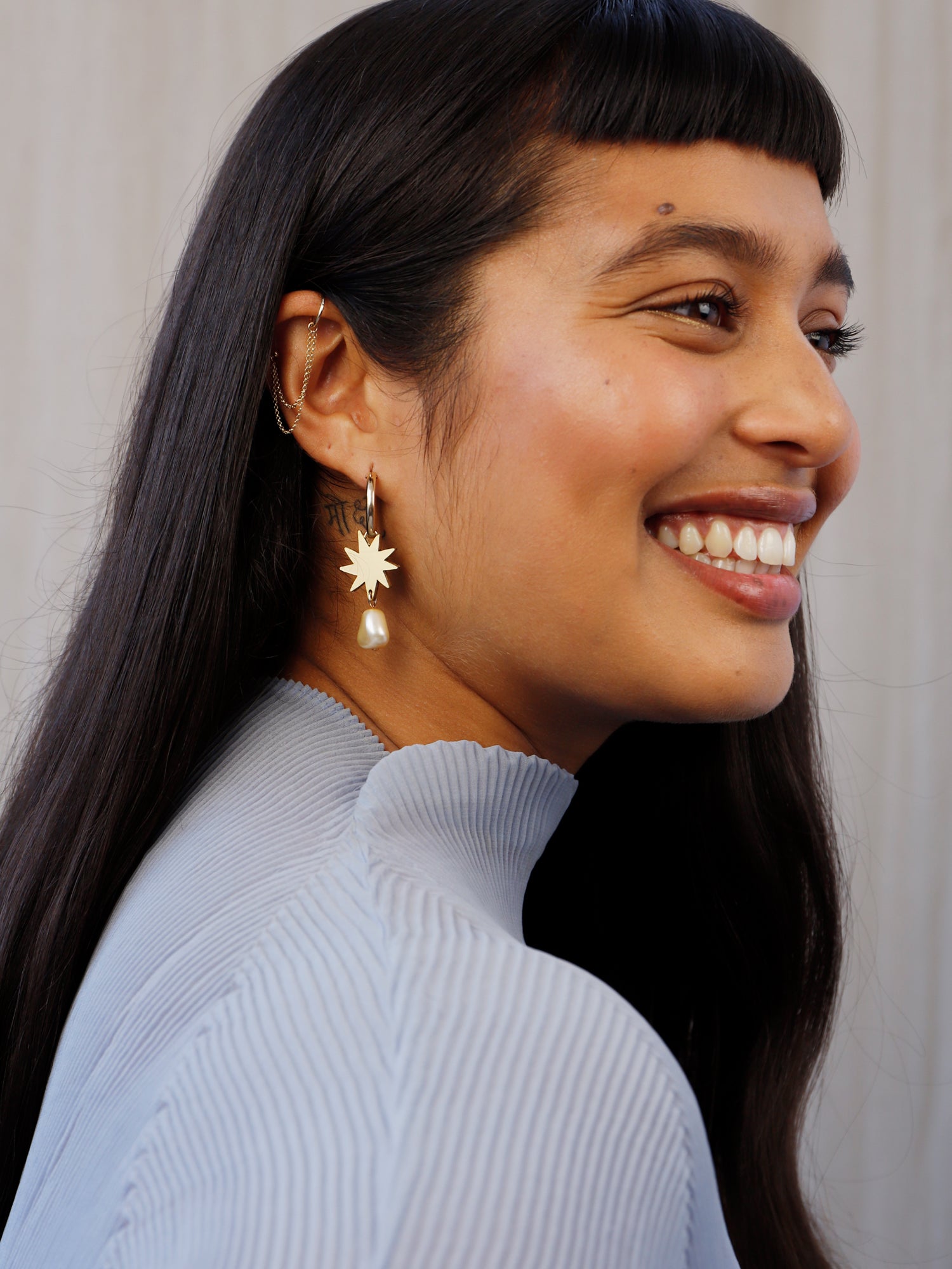 Elegant hoop earrings, inspired by Matisse's cutout-style stars. Made in brass with our signature wood base, Czech glass baroque pearls and 14k gold-filled findings. Handmade in the UK by Wolf & Moon.