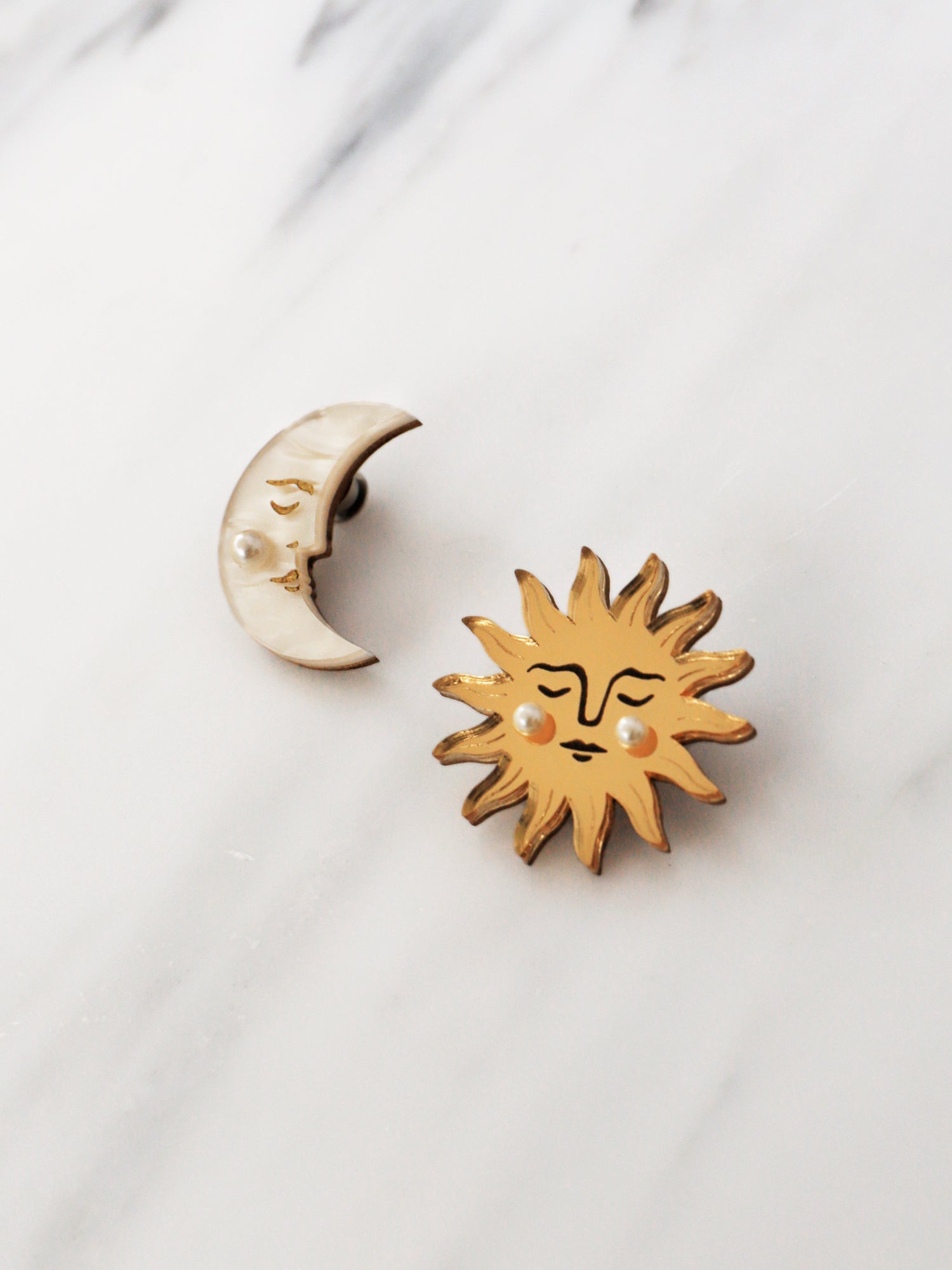 Sun & Moon Brooch Set. 2 brooches made with laser cut acrylic, Czech glass pearls and hand inked details. Handmade in the UK by Wolf & Moon.