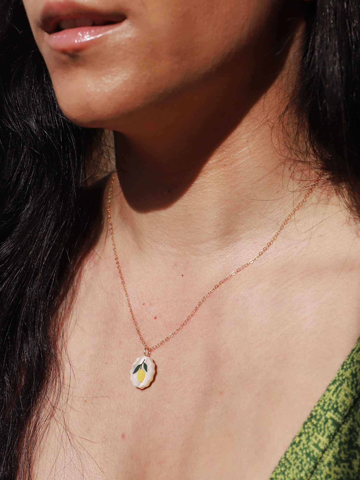 Lemon charm necklace made from acrylic and a 14k gold-filled chain & findings. Handmade in the UK by Wolf & Moon.