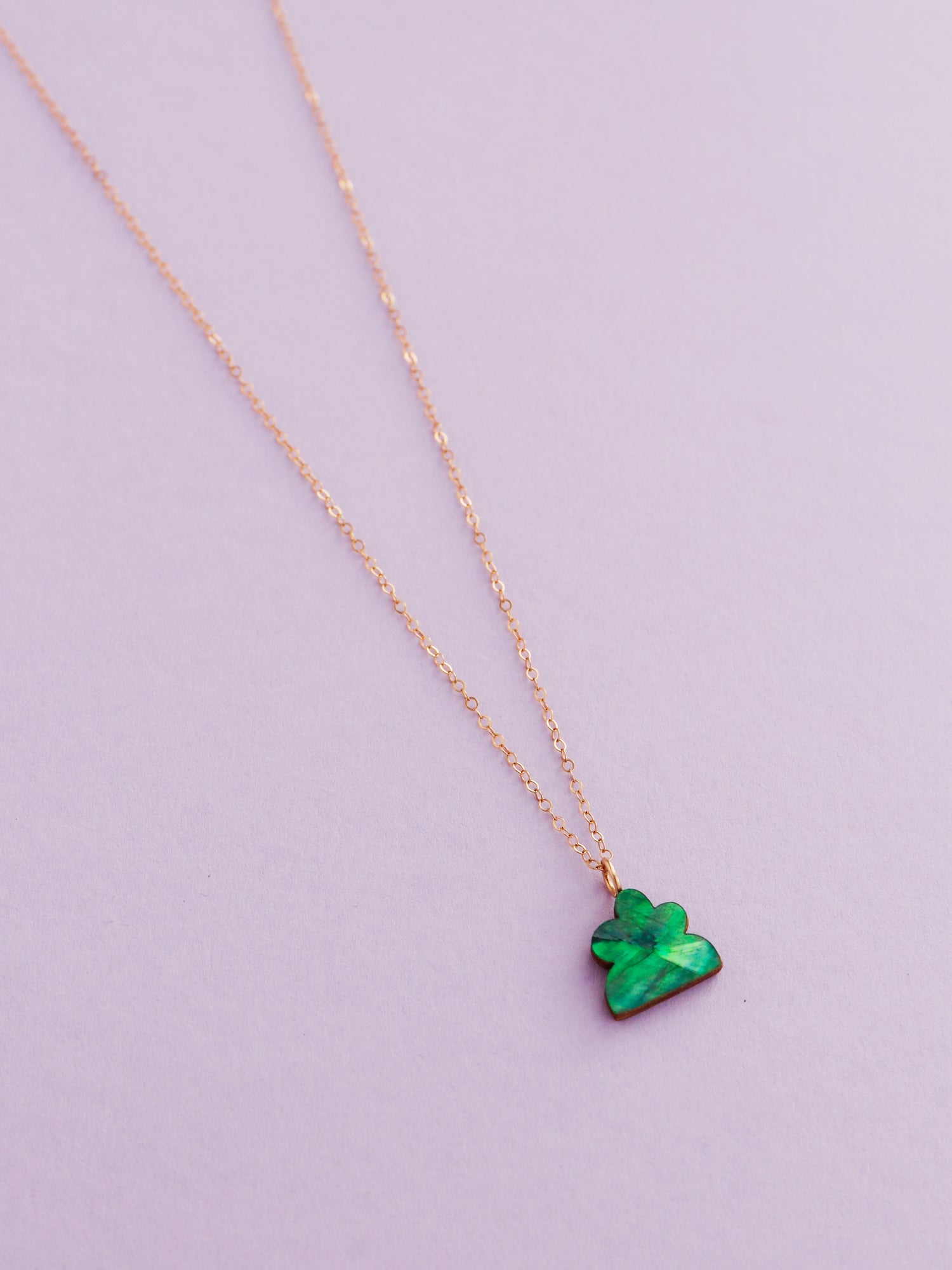 Lena Necklace in Emerald. A confetti-inspired abstract pendant on a 45cm 14k gold-filled chain. Made with a lovely iridescent shell veneer which catches the light beautifully. Made in the UK by Wolf & Moon.