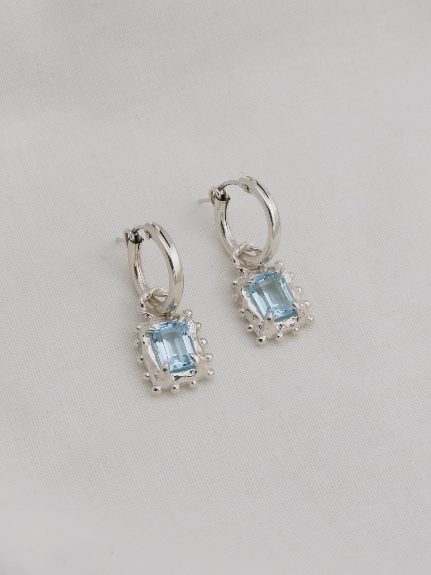 Memento Hoops with Sky Topaz - Silver