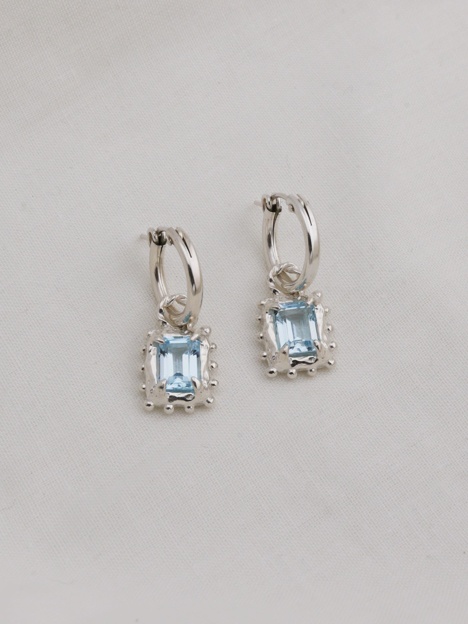 Memento Hoops with Sky Topaz - Silver