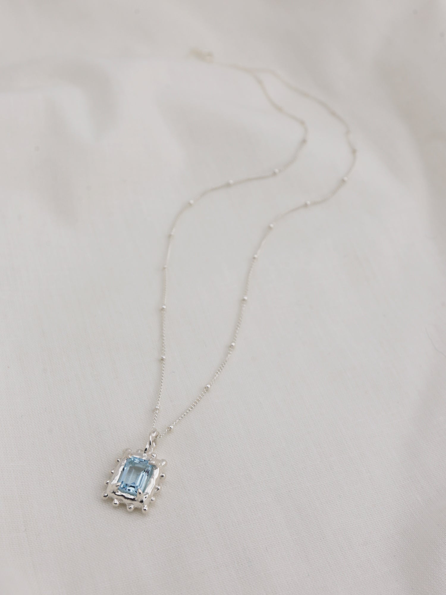 Memento Necklace with Sky Topaz - Silver