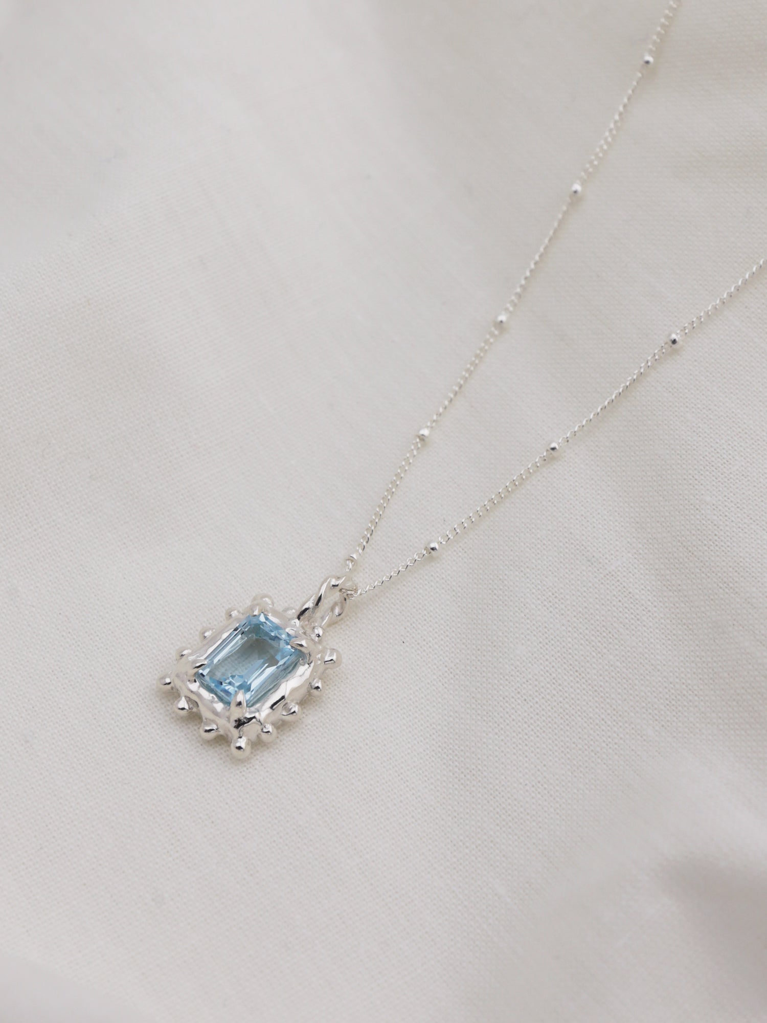 Memento Necklace with Sky Topaz - Silver