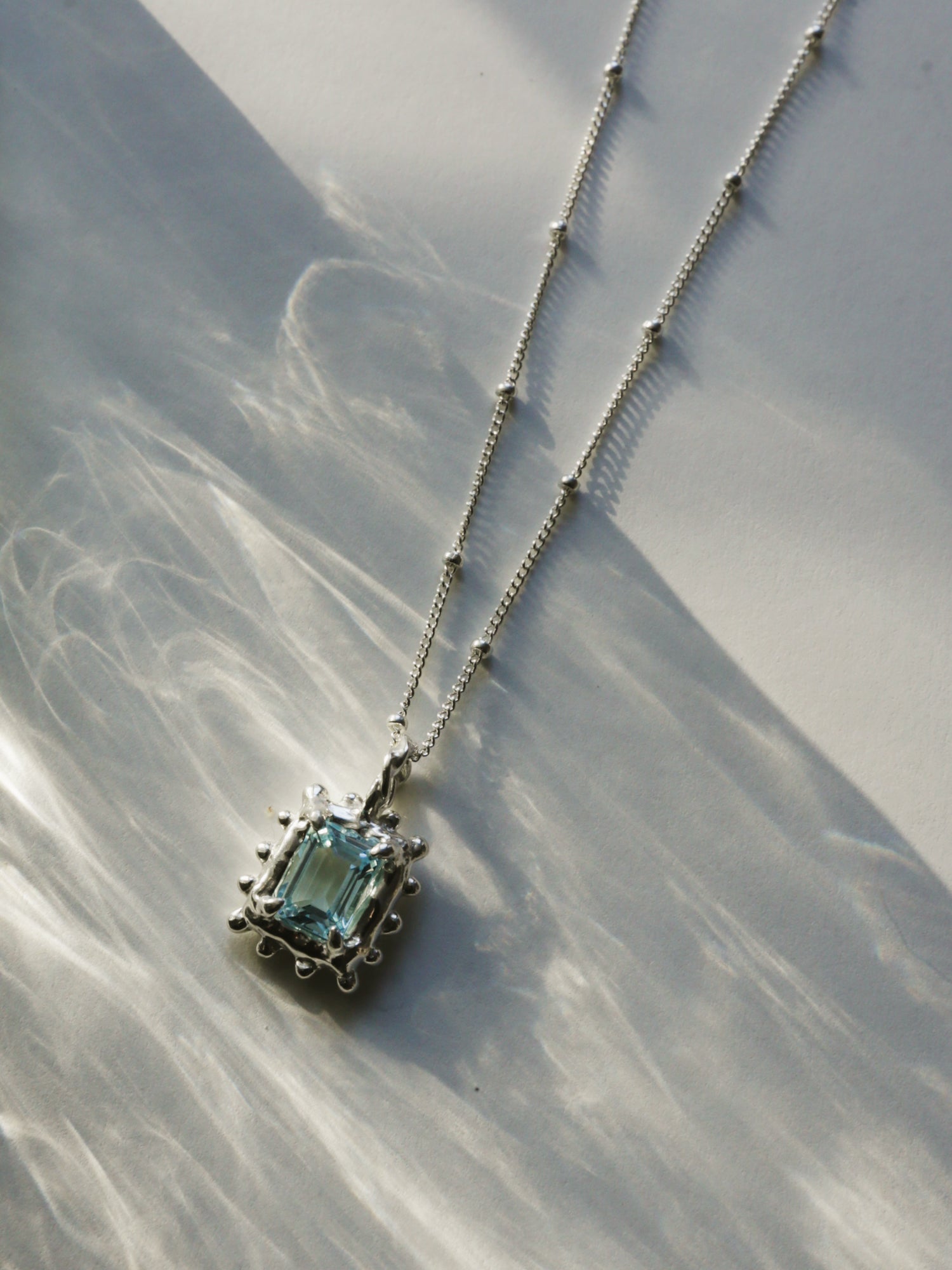 Memento Necklace with Sky Topaz - Silver
