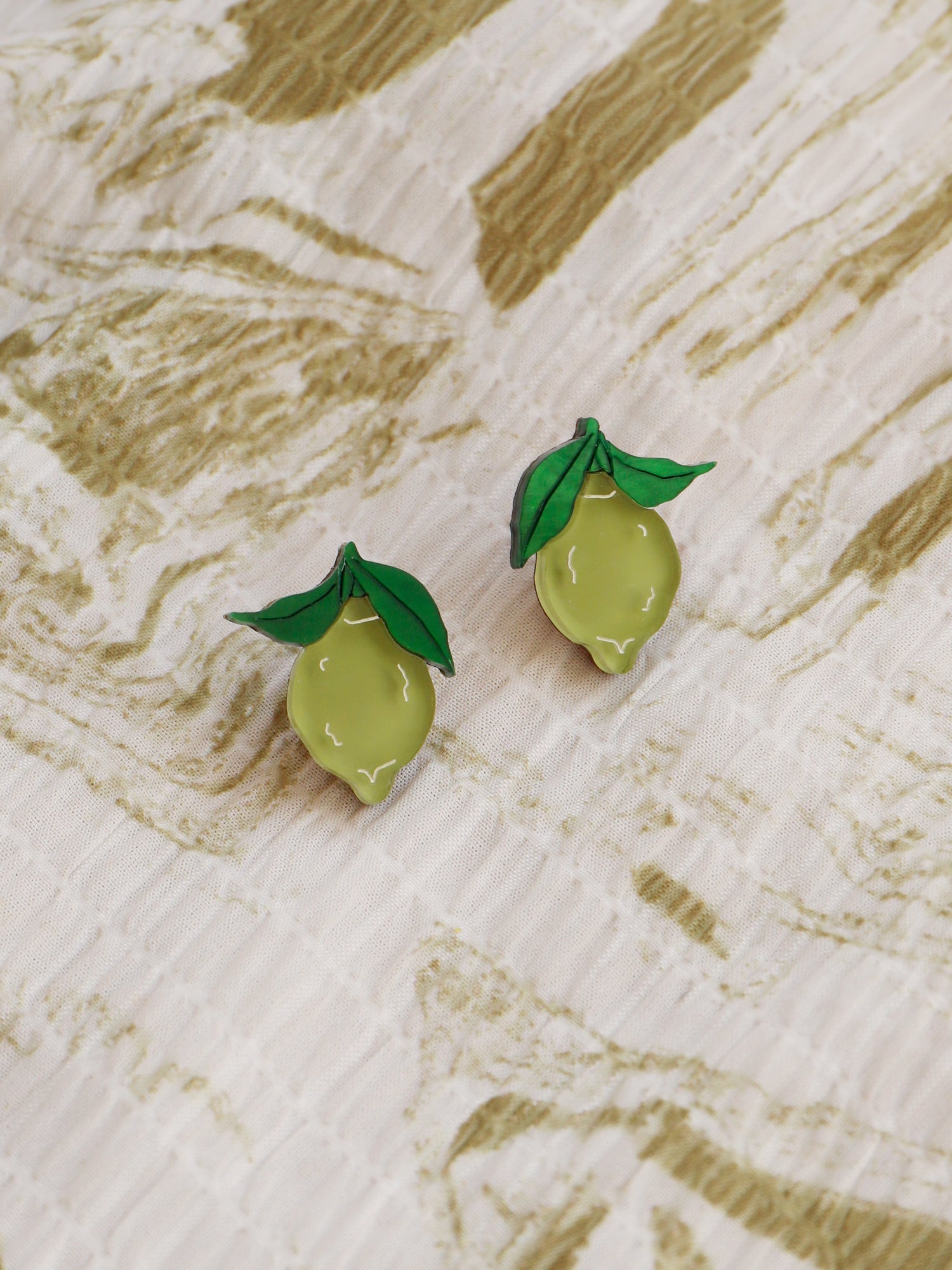 Lime studs made with wood, 64% recycled acrylic and hand-inked details with sterling silver earring posts & butterflies. Handmade in the UK at Wolf & Moon.