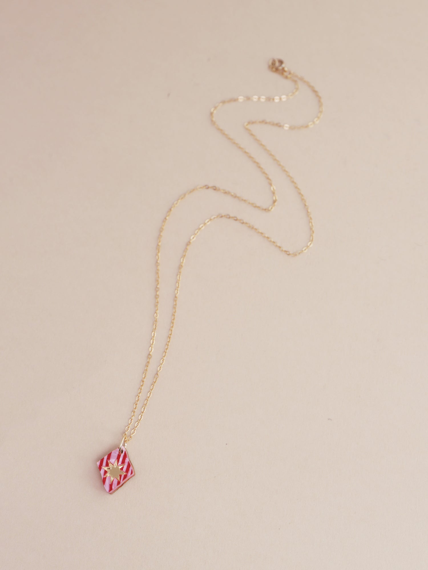 Nova Necklace in Rose featuring a unique design and lightweight gold-filled chain, handmade in UK by Wolf & Moon.