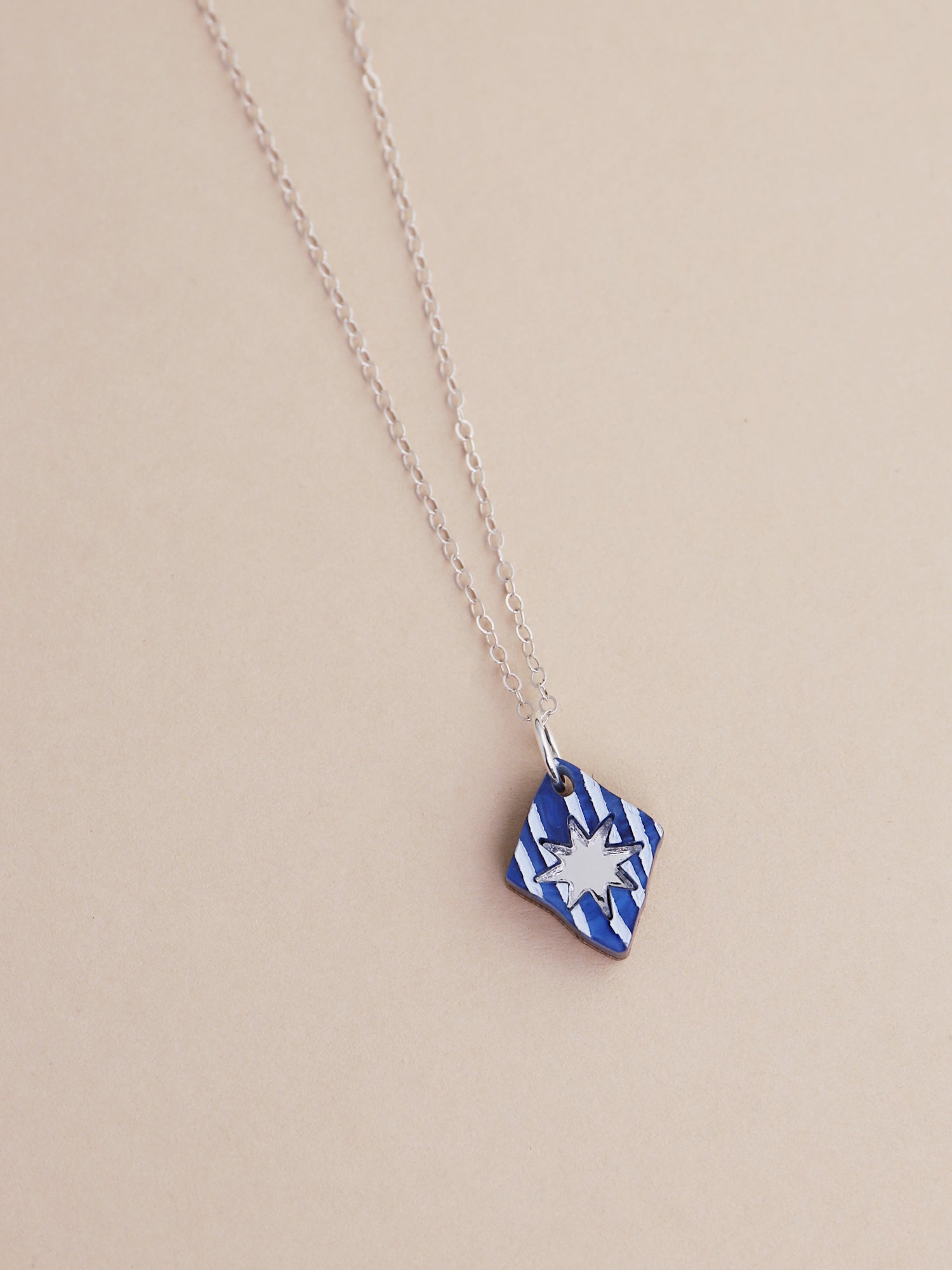 Nova Necklace in Sapphire by Wolf & Moon, handmade in UK with intricate details and lightweight acrylic design.