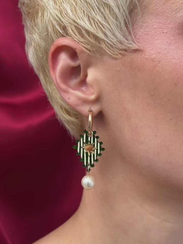 Cirque Hoops in Jade displayed on model's ear, handmade in UK by Wolf & Moon, featuring intricate design and glass pearl.