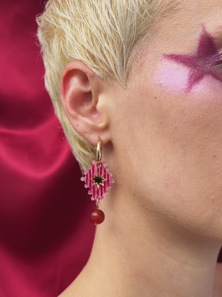 Cirque Hoops in Rose worn by a model; handmade in UK by Wolf & Moon with intricate bead details.
