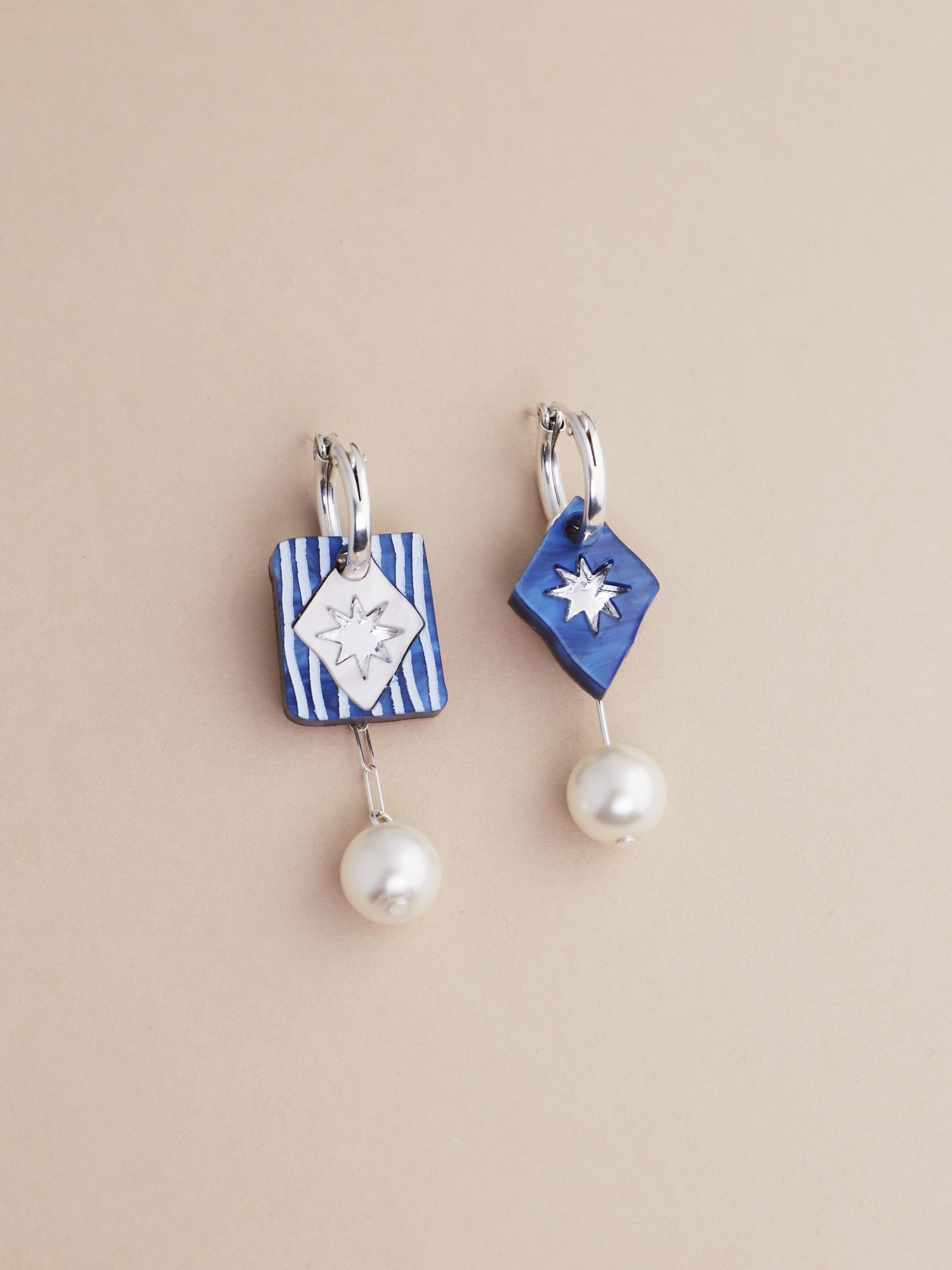 Stella Charm Hoops in Sapphire earrings featuring hand-inked details and glass pearl accents, handmade in UK by Wolf & Moon.