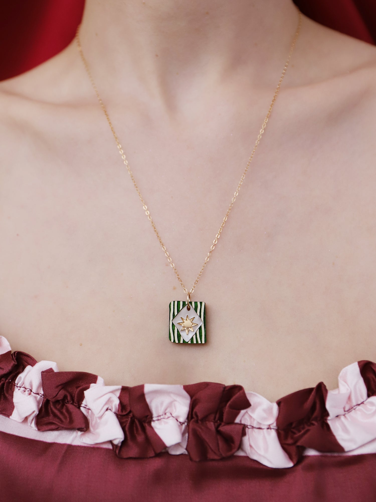 Stella Necklace in Jade featuring hand-inked details, handmade in UK by Wolf & Moon, photographed on a model.