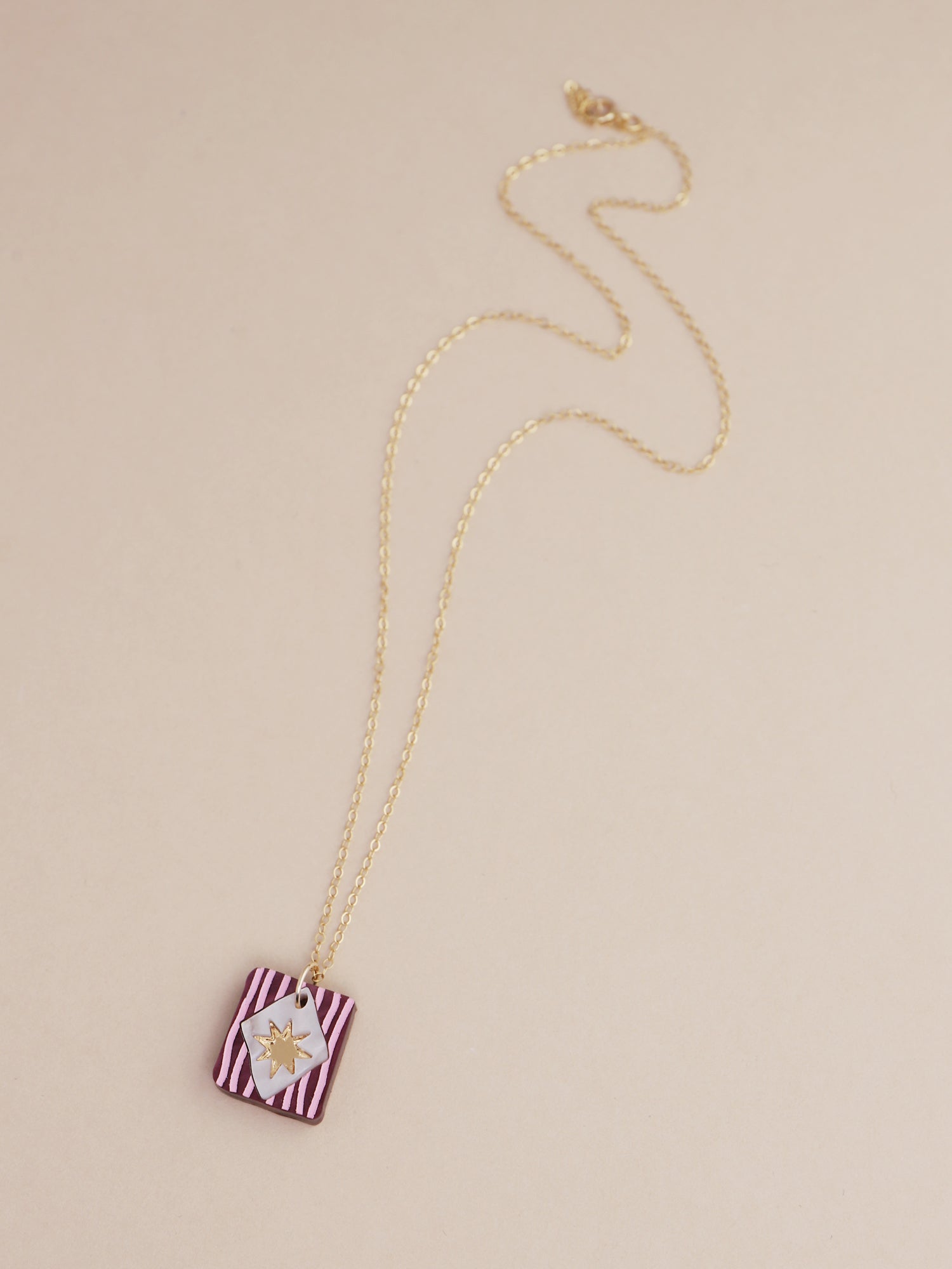 Stella Necklace in Cherry, handmade in UK by Wolf & Moon, lightweight acrylic pendant on gold-filled chain.