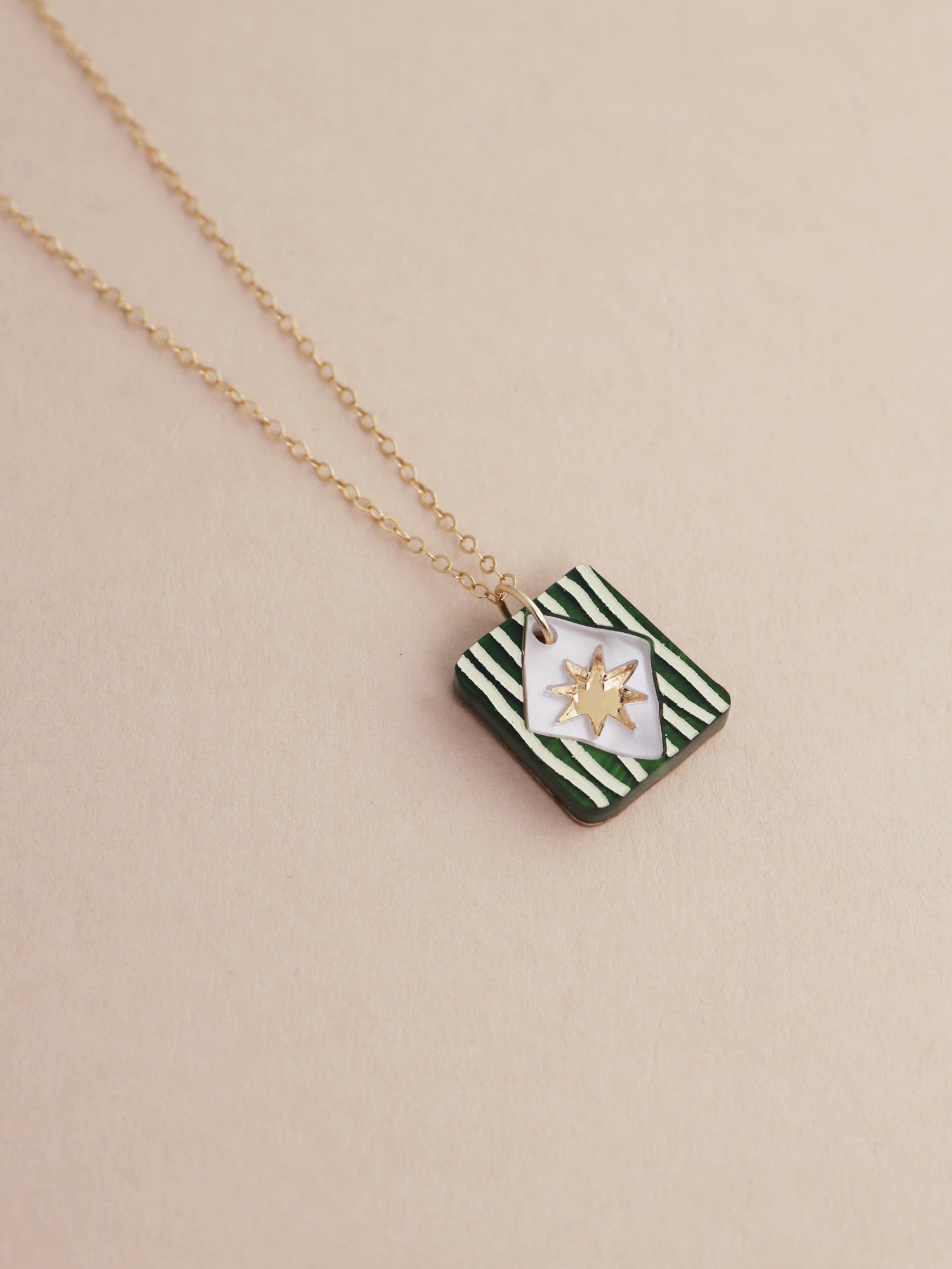 Stella Necklace in Jade by Wolf & Moon, handmade in UK, featuring a star pendant on a gold-filled chain.