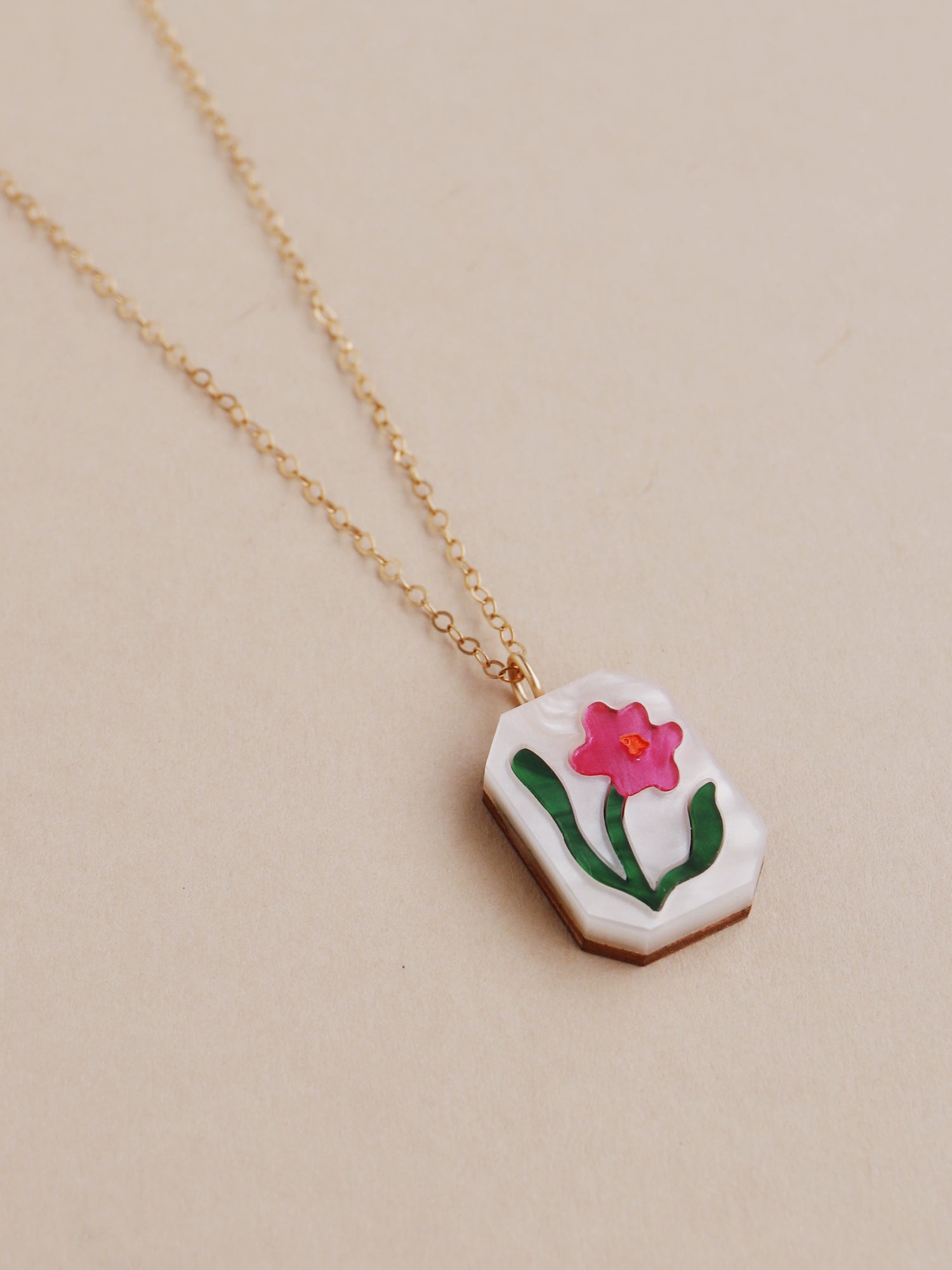 Flower charm necklace made from acrylic and a 14k gold-filled chain & findings. Handmade in the UK by Wolf & Moon