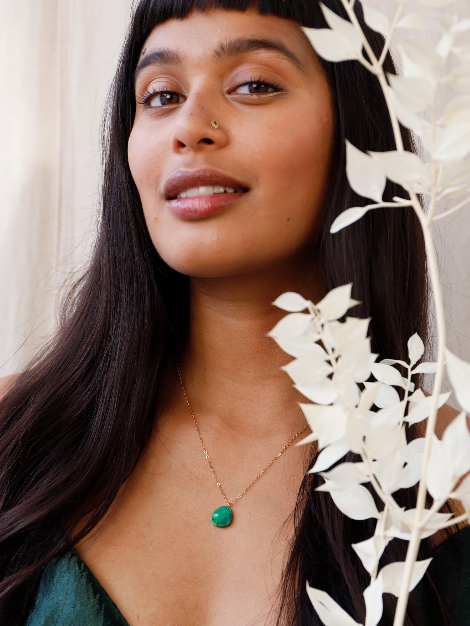Beatrice Necklace in Emerald. Simple abstract pendant featuring emerald mother of pearl veneer and a 14k gold-filled chain. Handmade in the UK by Wolf & Moon.