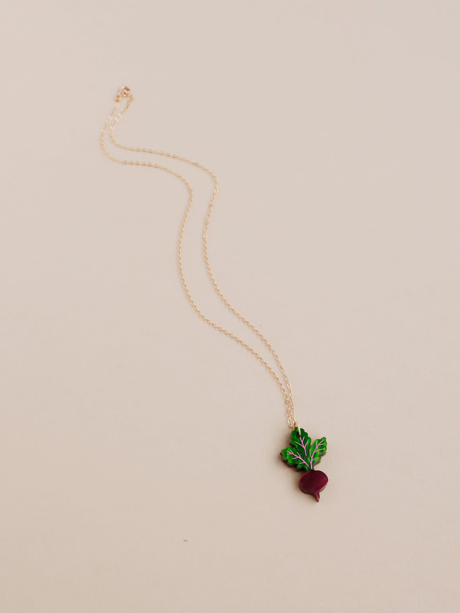Purple and green acrylic mini beetroot pendant necklace with optional gold-filled chain. Handmade in London by Wolf & Moon.