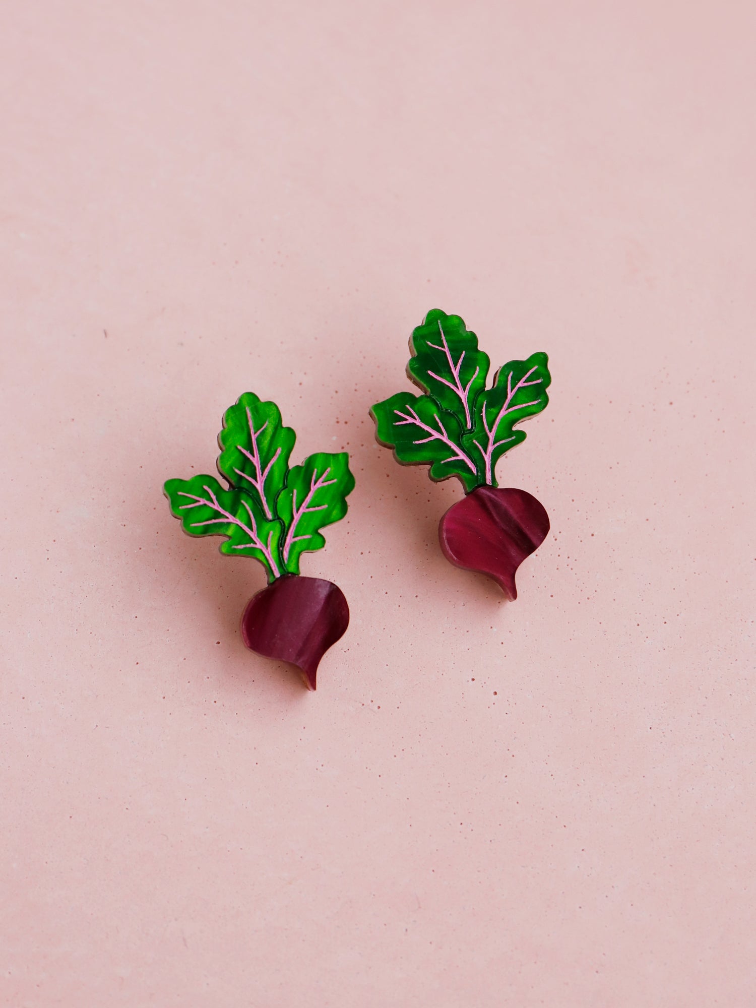 Purple and green hand-inked beetroot acrylic mini studs with silver posts. Handmade in London by Wolf & Moon.