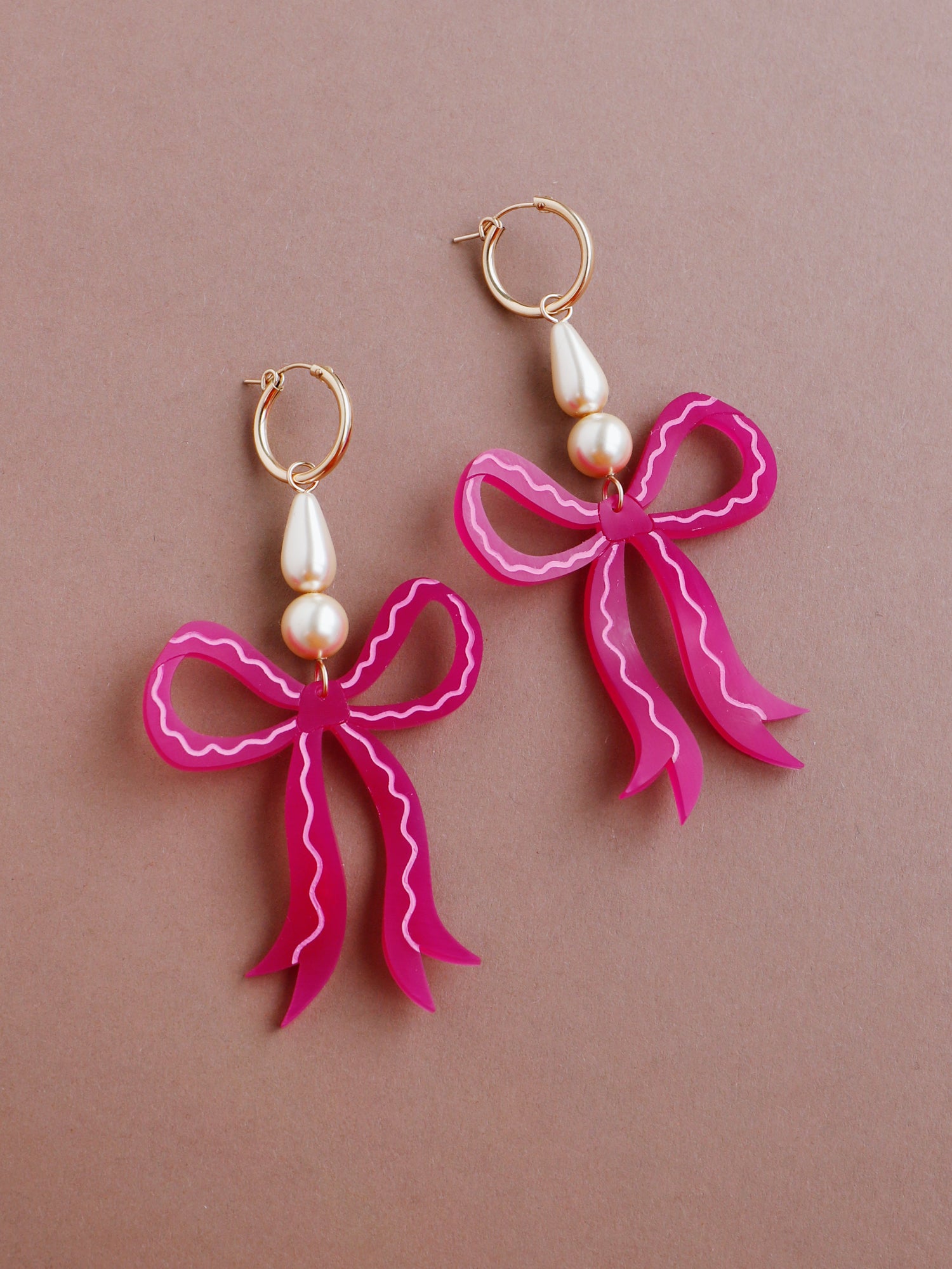 Bow Statement Hoops in Magenta