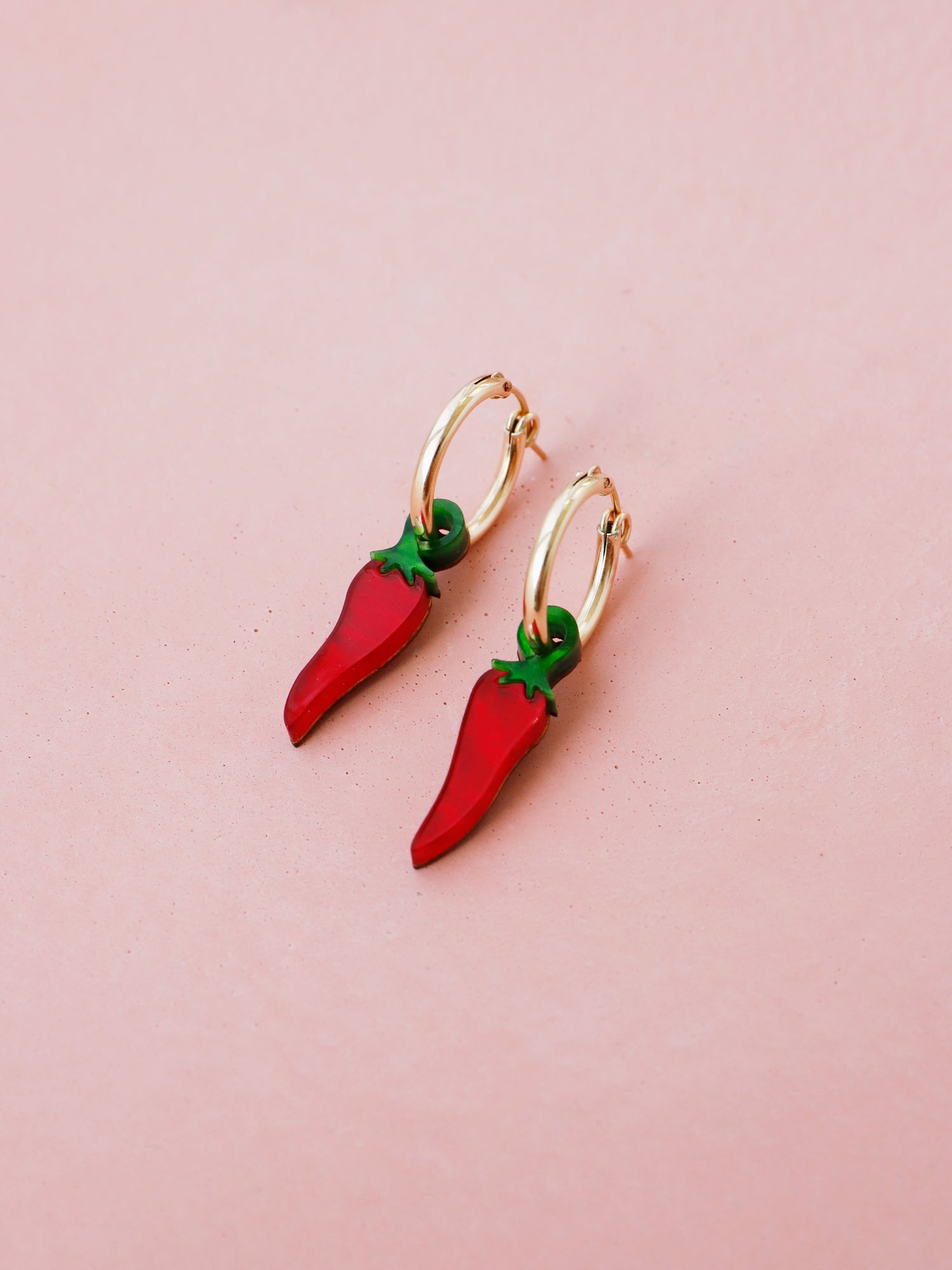 Red chilli pepper acrylic charms with optional gold-filled hoops. Handmade in London by Wolf & Moon.