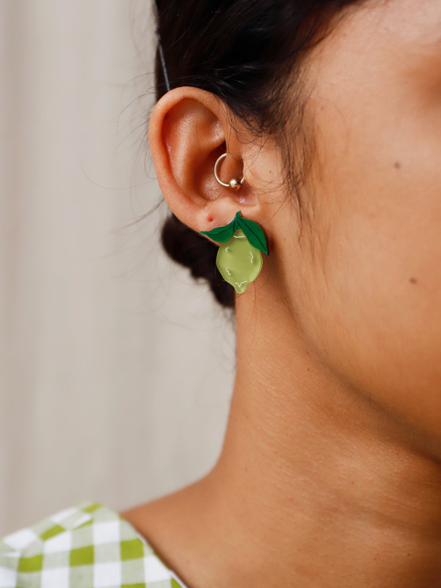 Lime studs made with wood, 64% recycled acrylic and hand-inked details with sterling silver earring posts & butterflies. Handmade in the UK at Wolf & Moon.