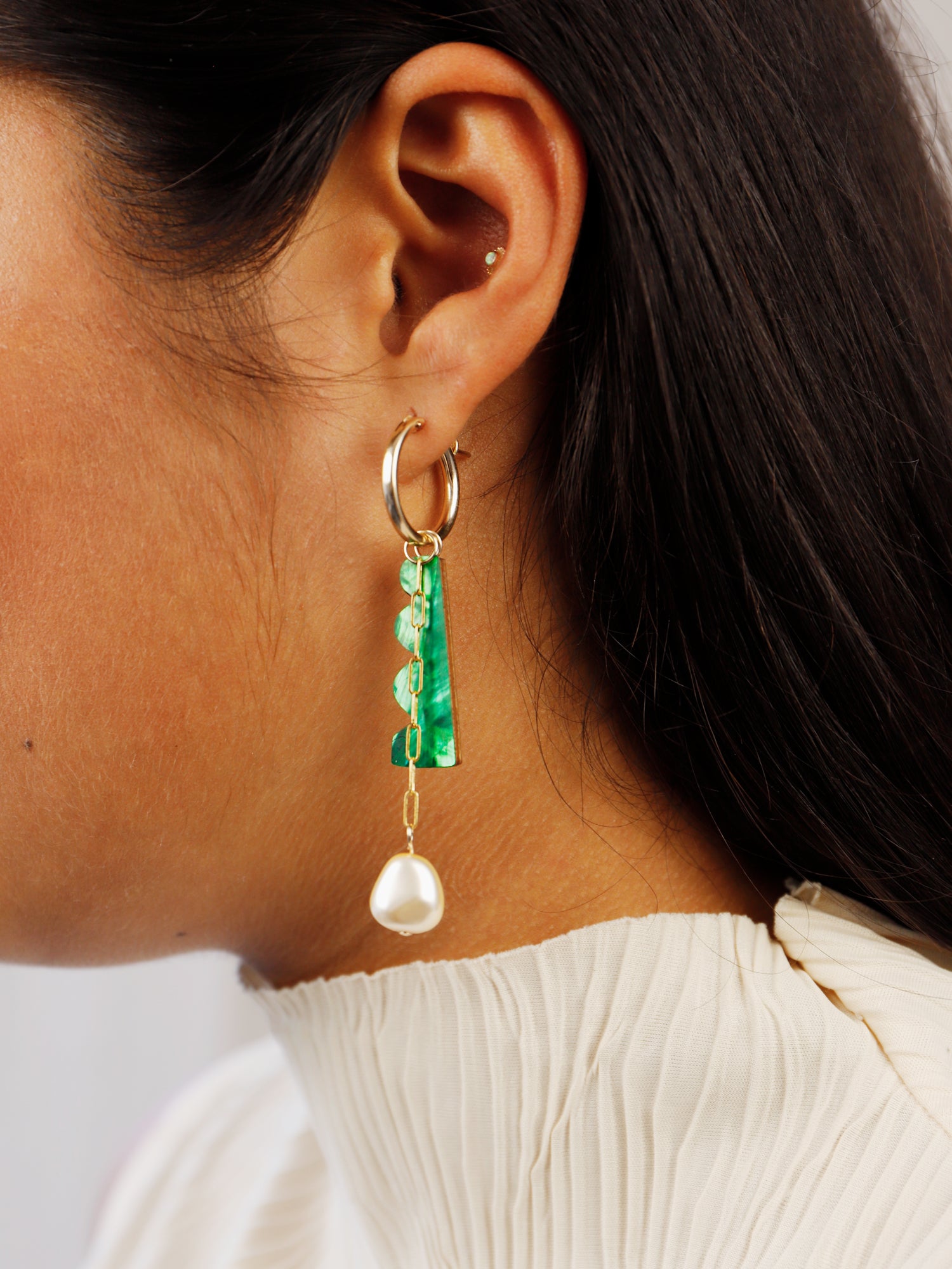 Martha Charm Hoops in Emerald. Playful hoop earrings with four interchangeable charms that can be worn individually or layered up in any combination. 14k gold-filled hoops. Handmade in the UK by Wolf & Moon.