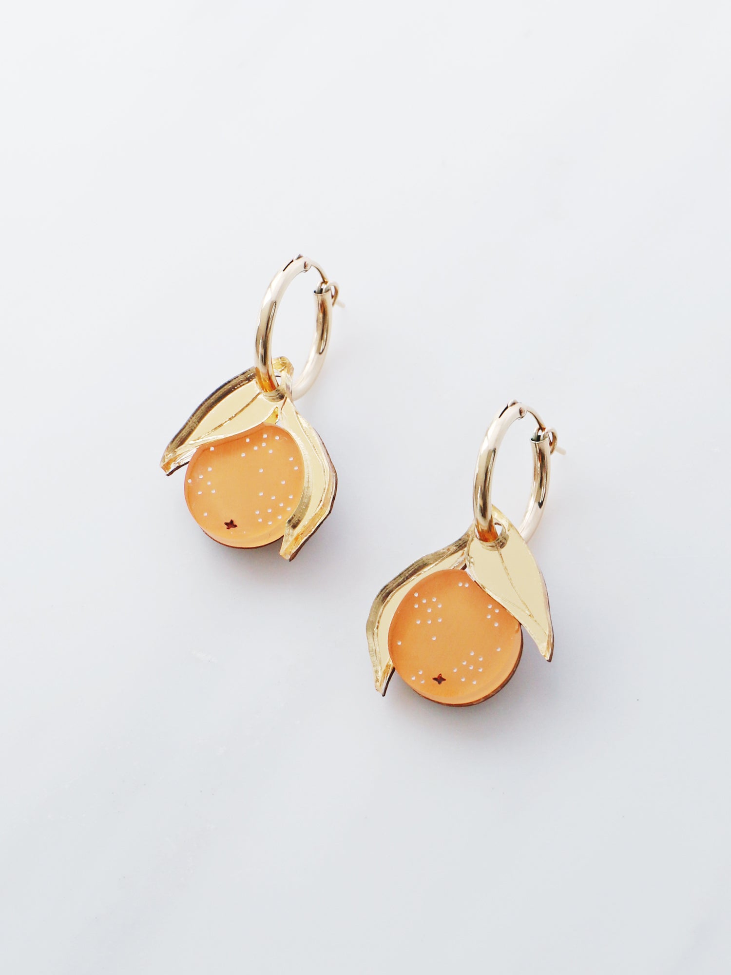 Mini Orange Hoops. Original jewellery handmade in the U.K. by Wolf & Moon.