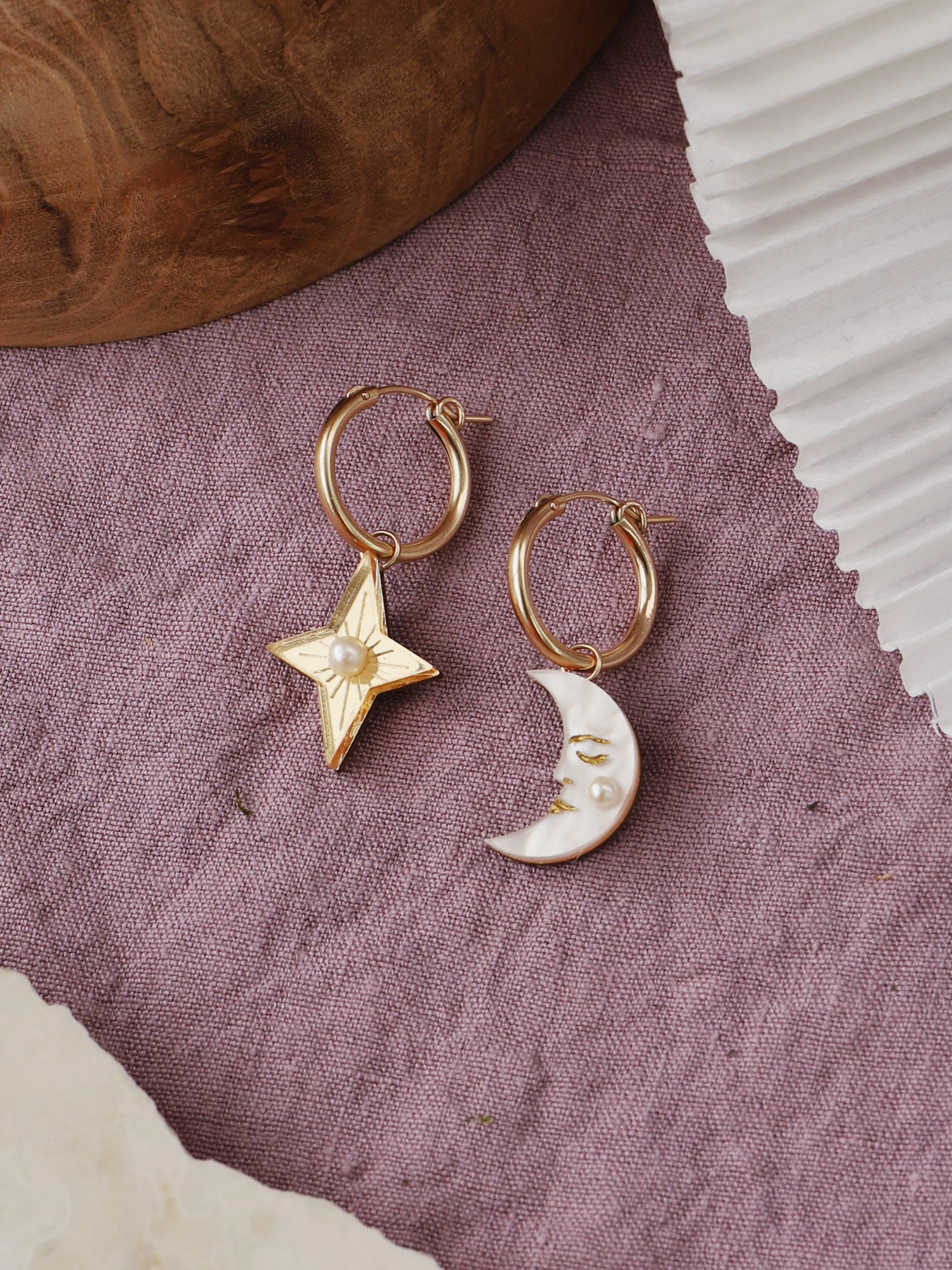 Mix ‘n’ match celestial charm set made with acrylic and glass pearls. This hoop set includes 4 x interchangeable charms. Wear with our 14k gold-filled hoops. This set includes: 1x 'Moon' charm, 1x ‘Star’ charm , 1 x 'Shooting Star' charm, 1 x 'Saturn' charm, 1 x 'Sun' charm & 1 x 'Cloud' charm. Handmade in London by Wolf & Moon.