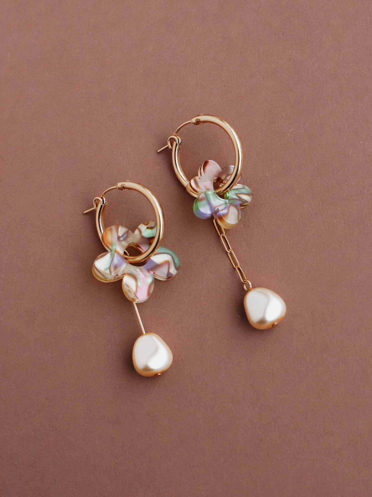 Ripple effect flower charms made from our recycled acrylic. Czech glass baroque pearls and 14k gold-filled hoops. Handmade in the UK by Wolf & Moon.