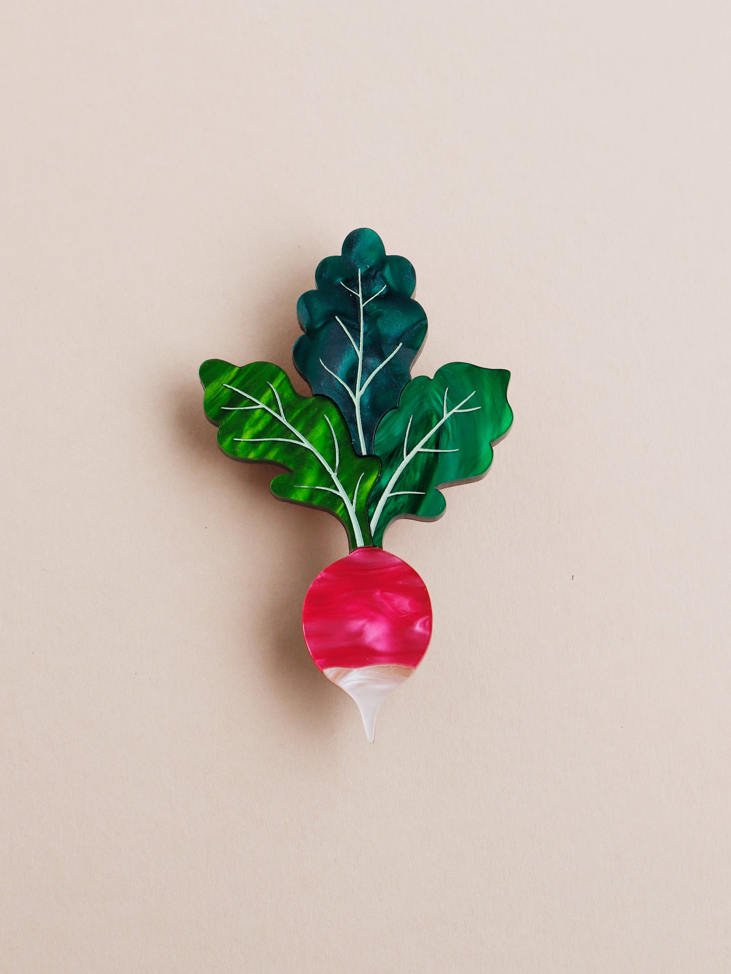 Pink and green statement acrylic radish brooch. Handmade in London by Wolf & Moon.