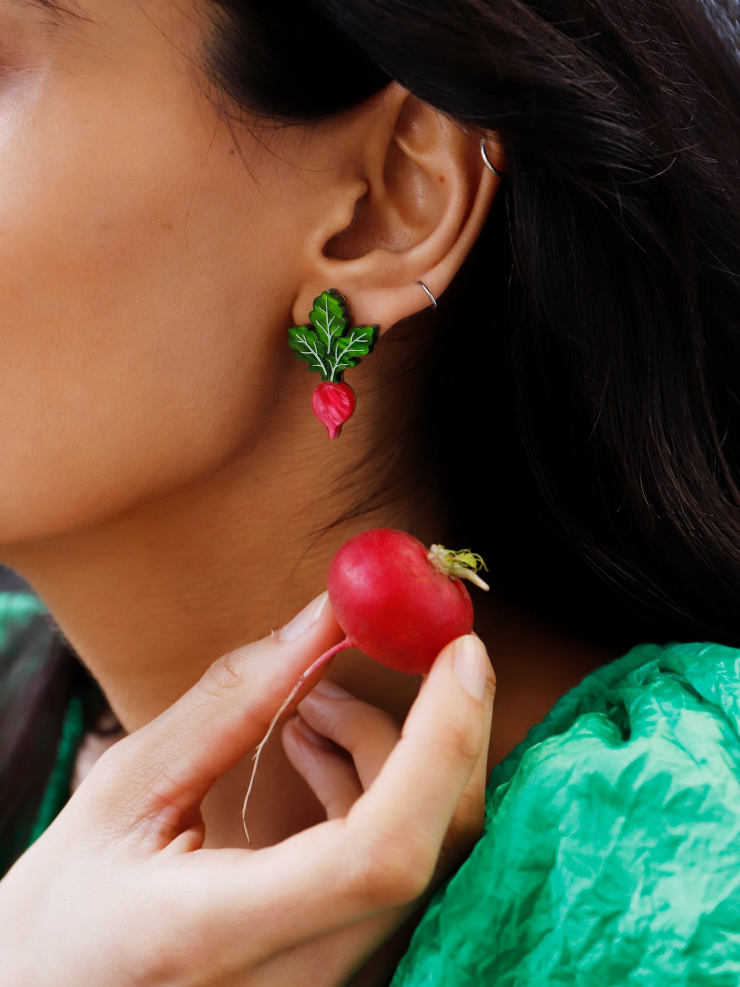 Pink and green acrylic mini radish stud earrings with silver clip on clasps. Handmade in London by Wolf & Moon.